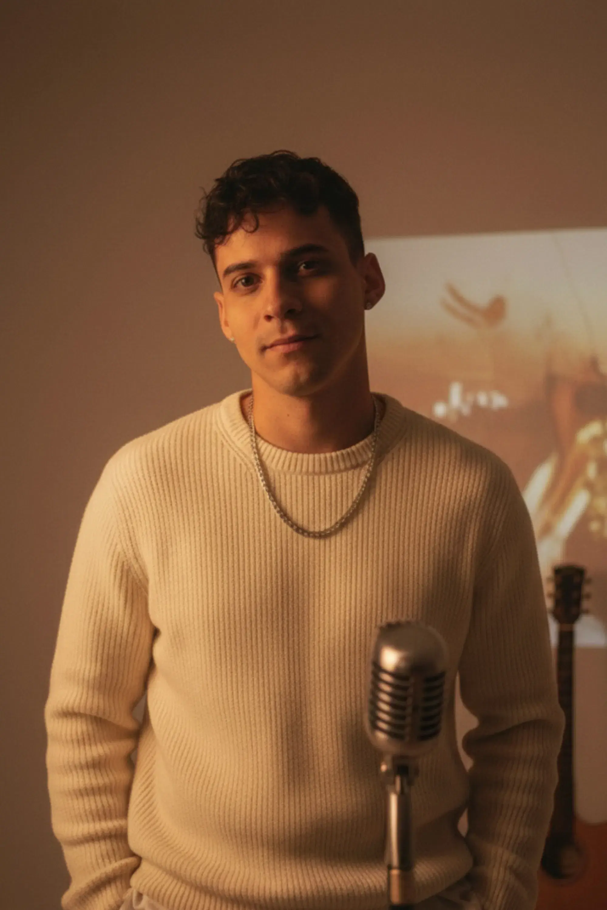 A professional and friendly portrait of Divino B'Atista for the about page.